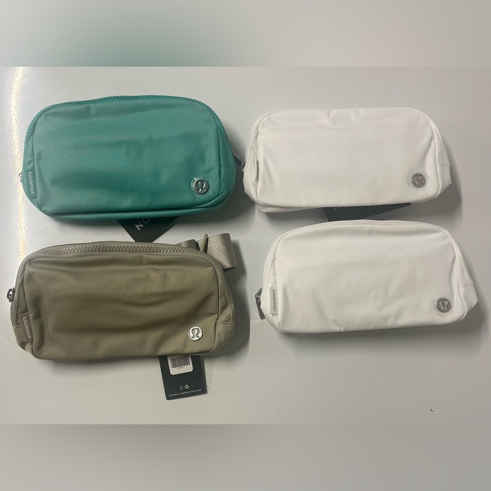 Peloton x Lululemon Belt Bag 
lot of 4 
teal 
2 white 
gray 
brand new NWT